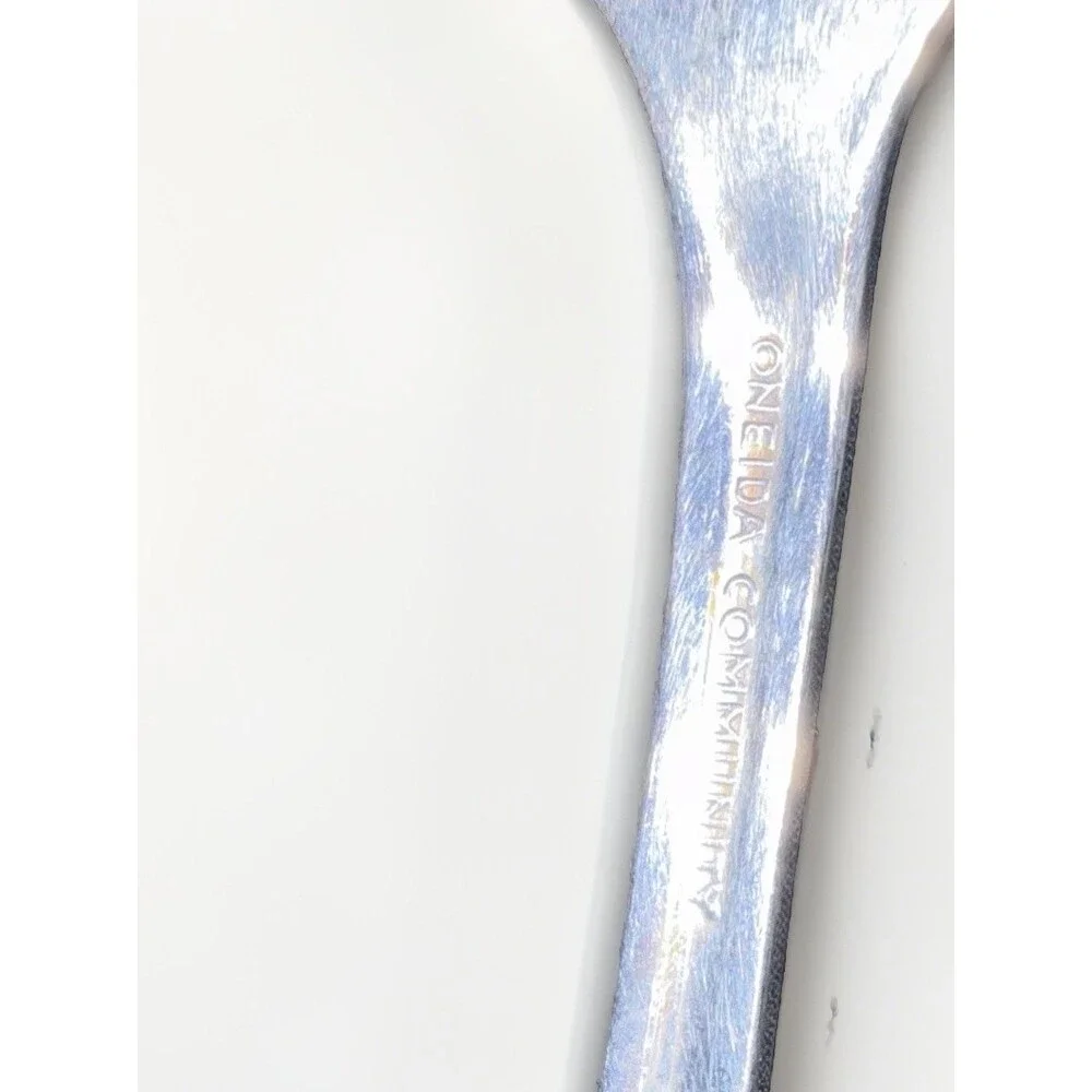 Oneida Community Royal Flute pierced pie server in stainless steel. 9.5”